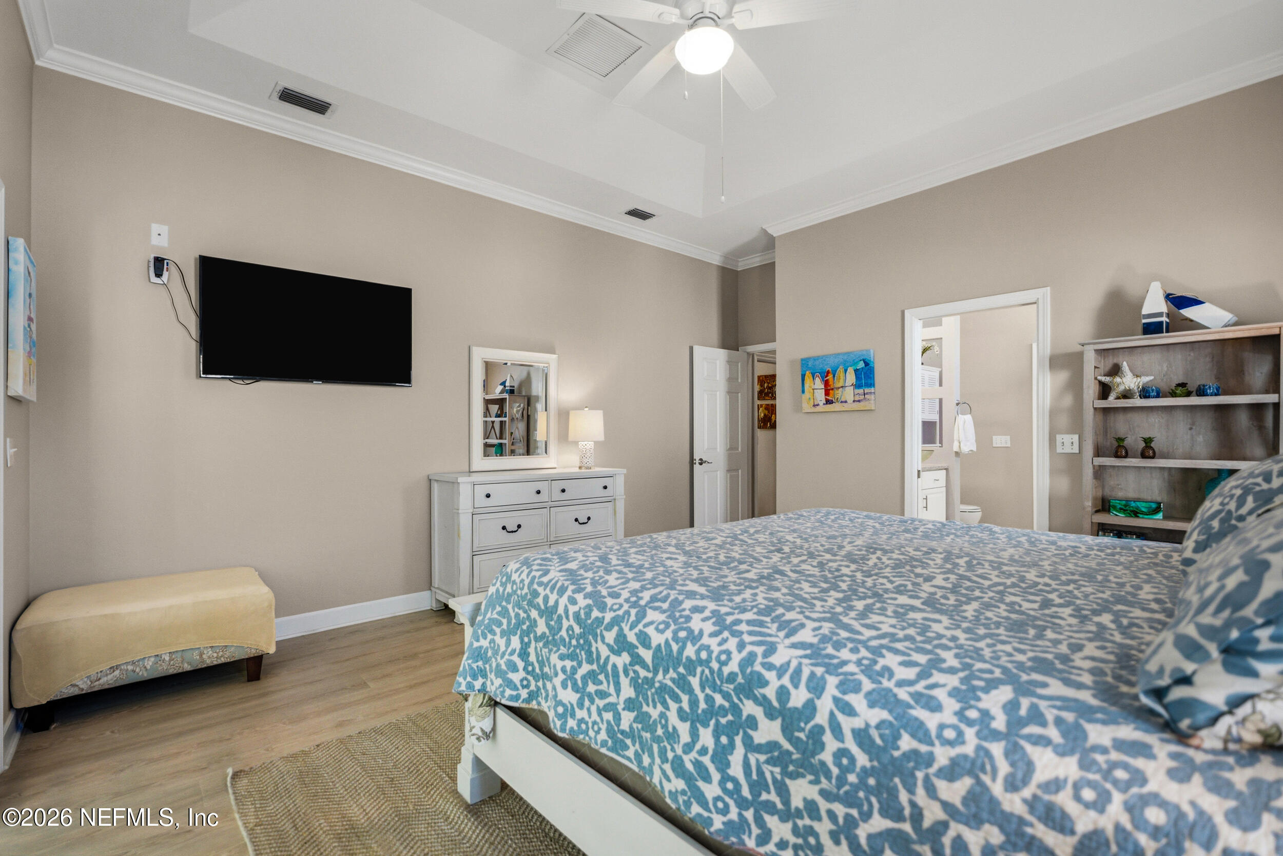 118 3rd Street St. Augustine, FL 32084 - Photo 29 of 77 a living room with a couch and a flat screen tv