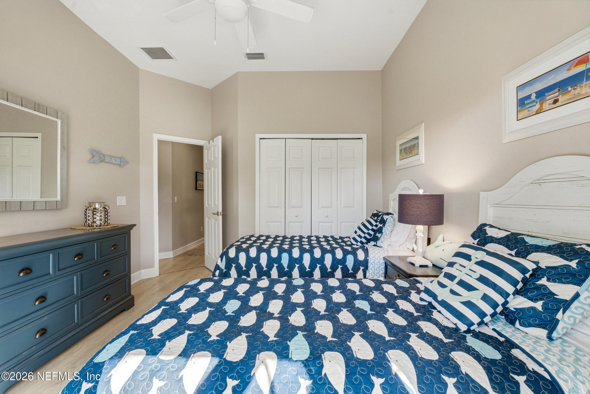 118 3rd Street St. Augustine, FL 32084 - Photo 38 of 77 a bedroom with a bed and a dresser