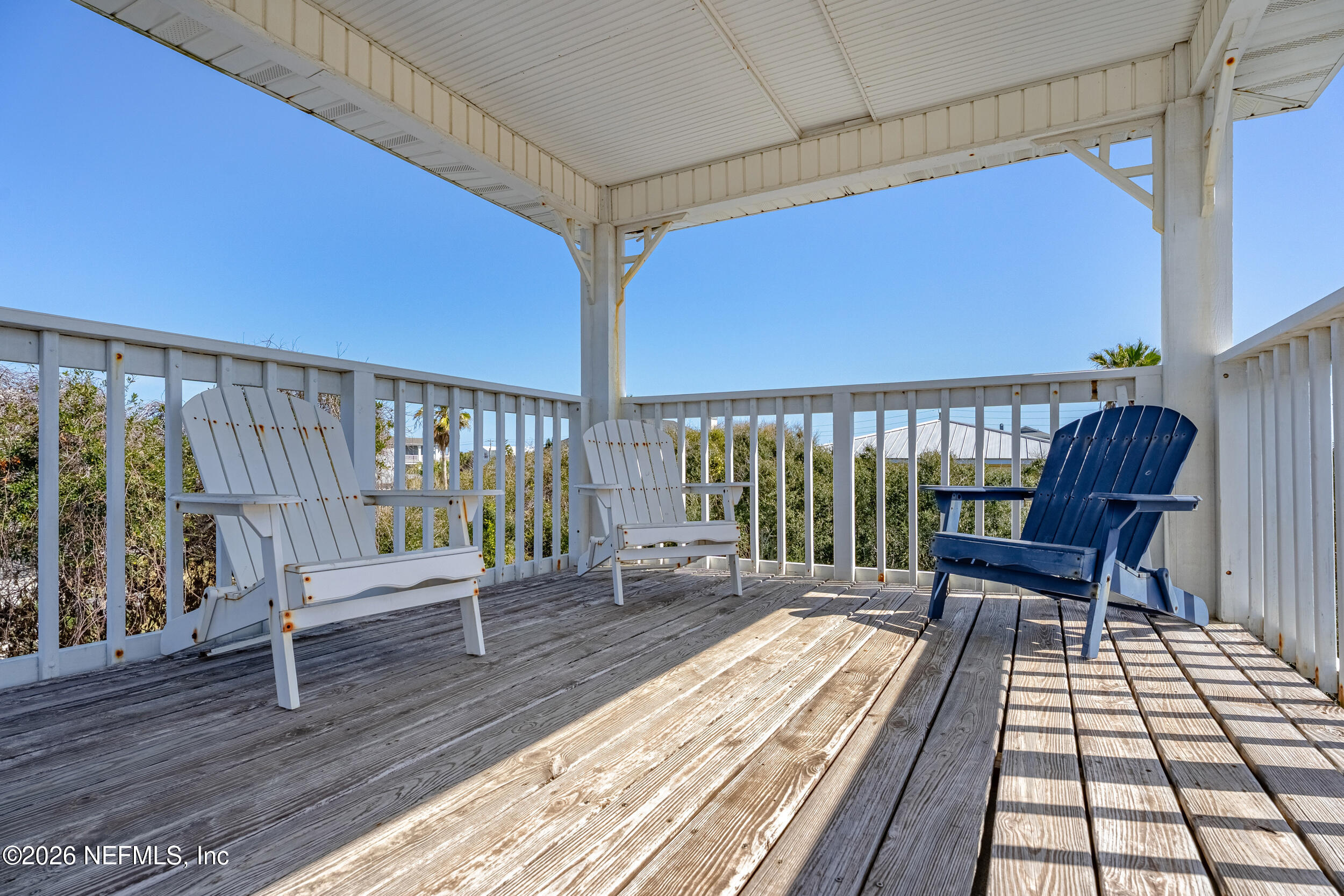 118 3rd Street St. Augustine, FL 32084 - Photo 47 of 77 a balcony with wooden floor