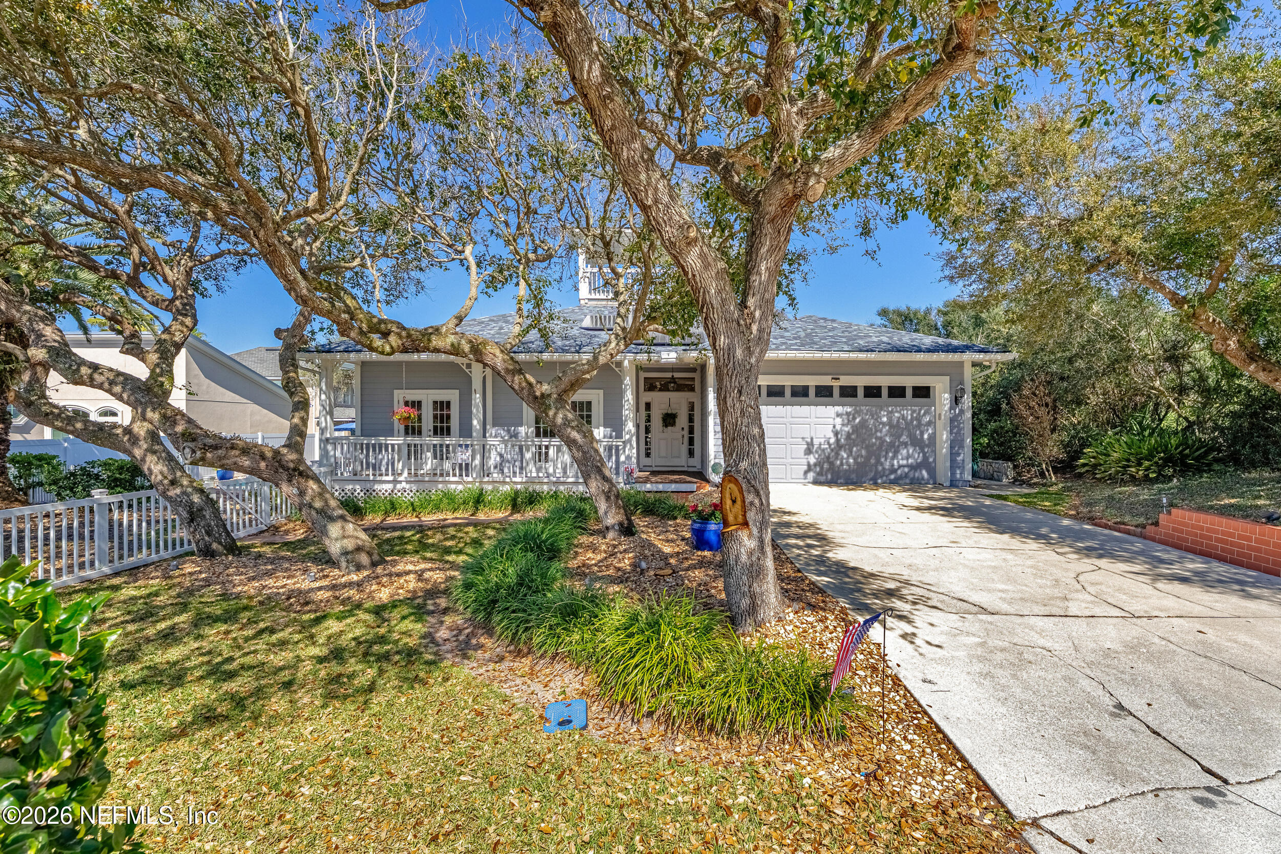 118 3rd Street St. Augustine, FL 32084 - Photo 5 of 77 a front view of a house with a yard