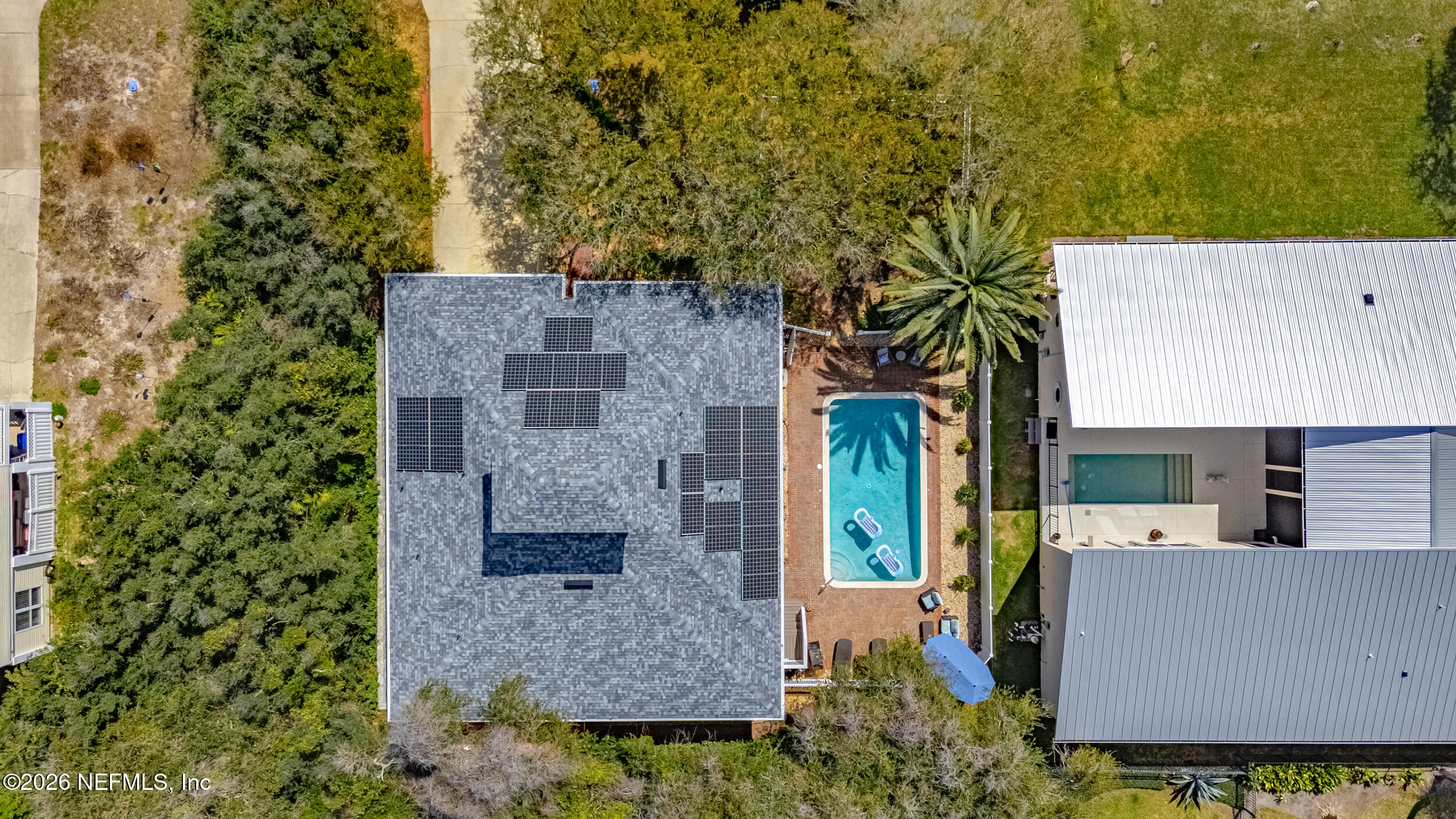 118 3rd Street St. Augustine, FL 32084 - Photo 71 of 77 an aerial view of a house with a yard and large tree