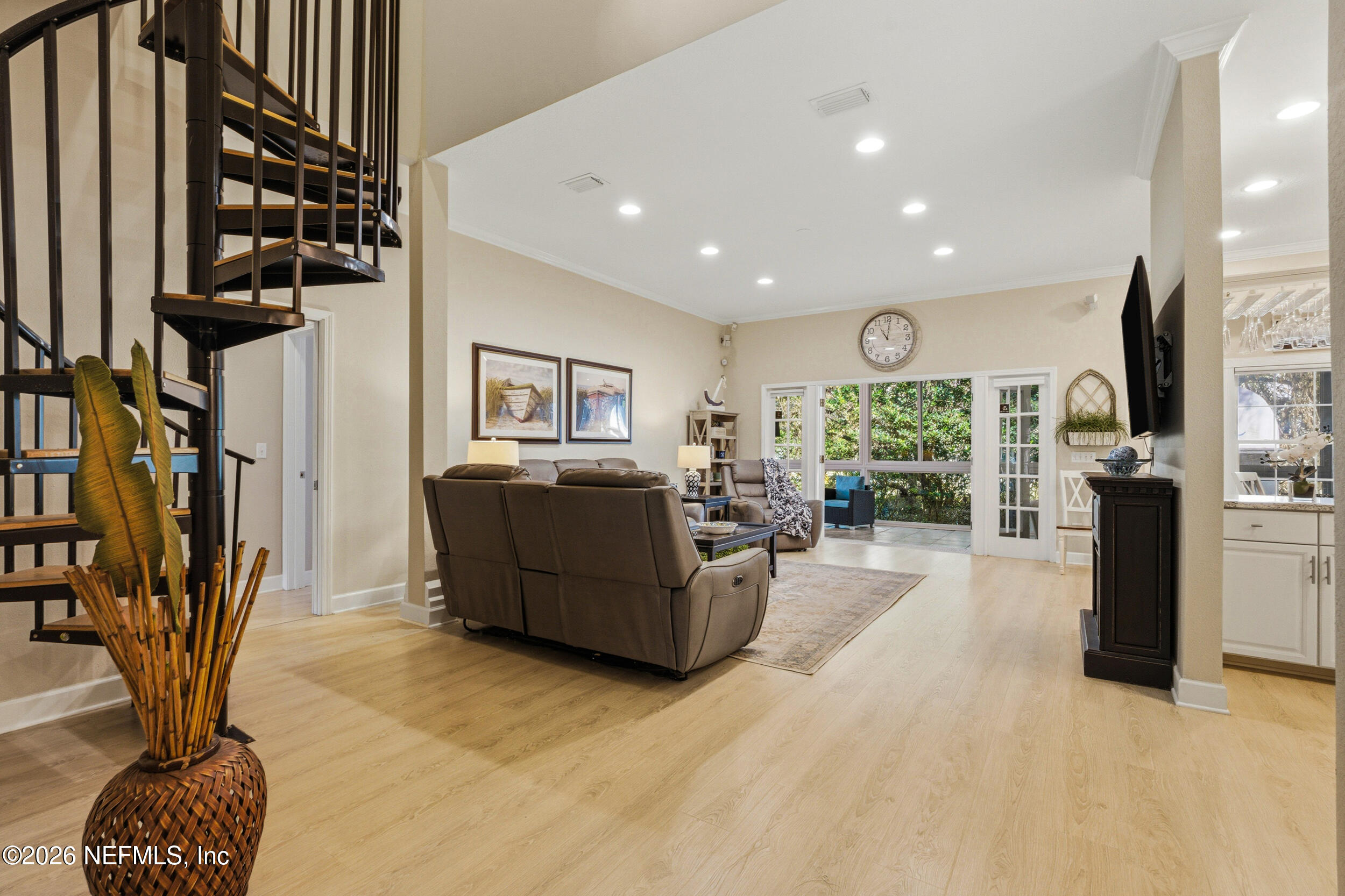 118 3rd Street St. Augustine, FL 32084 - Photo 8 of 77 a living room with furniture and a potted plant