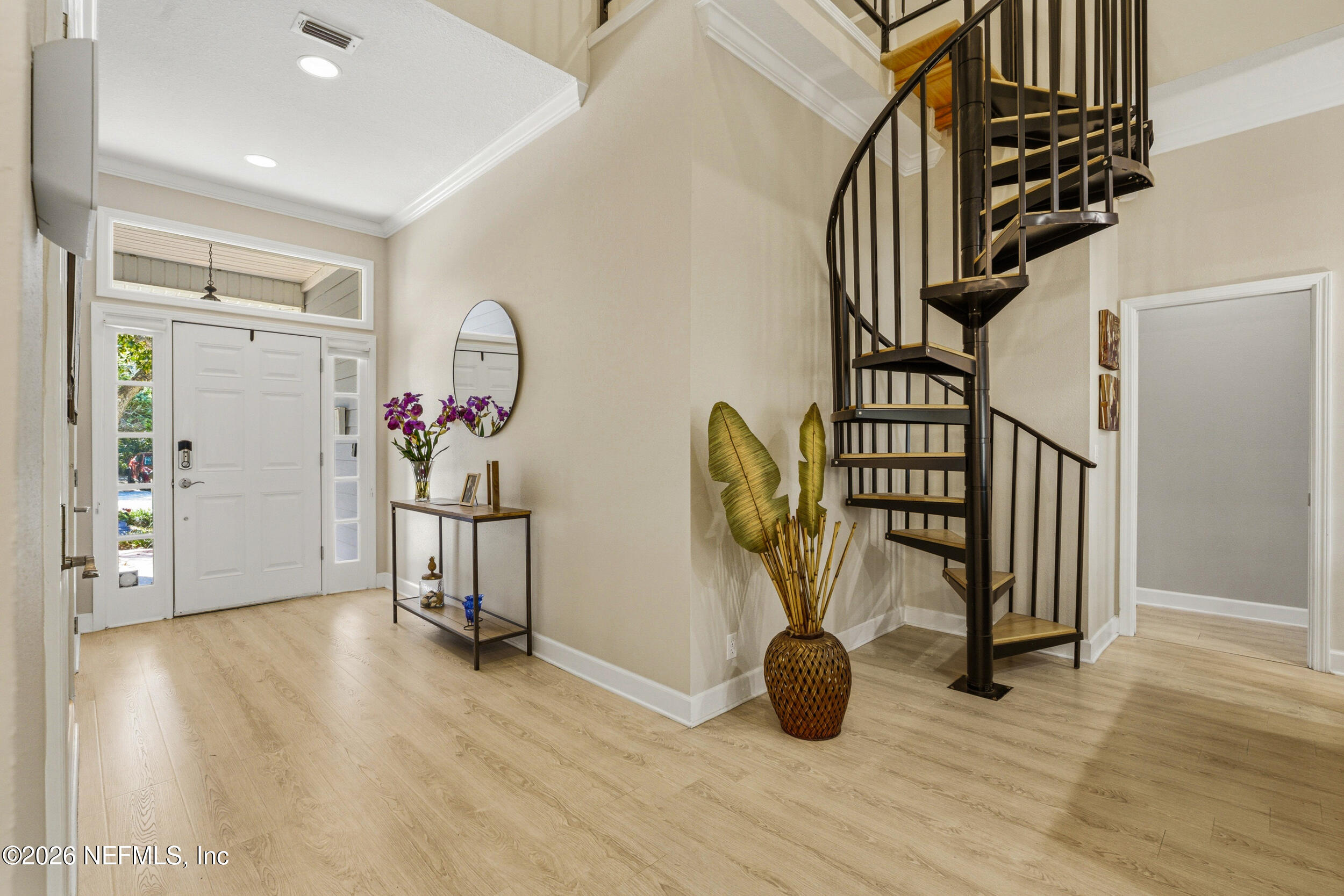 118 3rd Street St. Augustine, FL 32084 - Photo 9 of 77 a view of entryway with livingroom and wooden floor