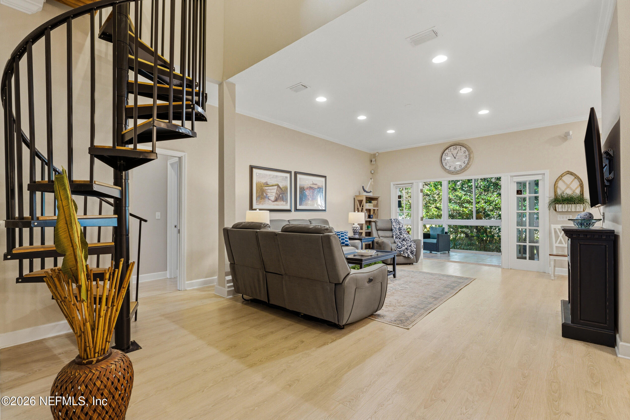 118 3rd Street St. Augustine, FL 32084 - Photo 10 of 77 a living room with furniture fireplace and flat screen tv