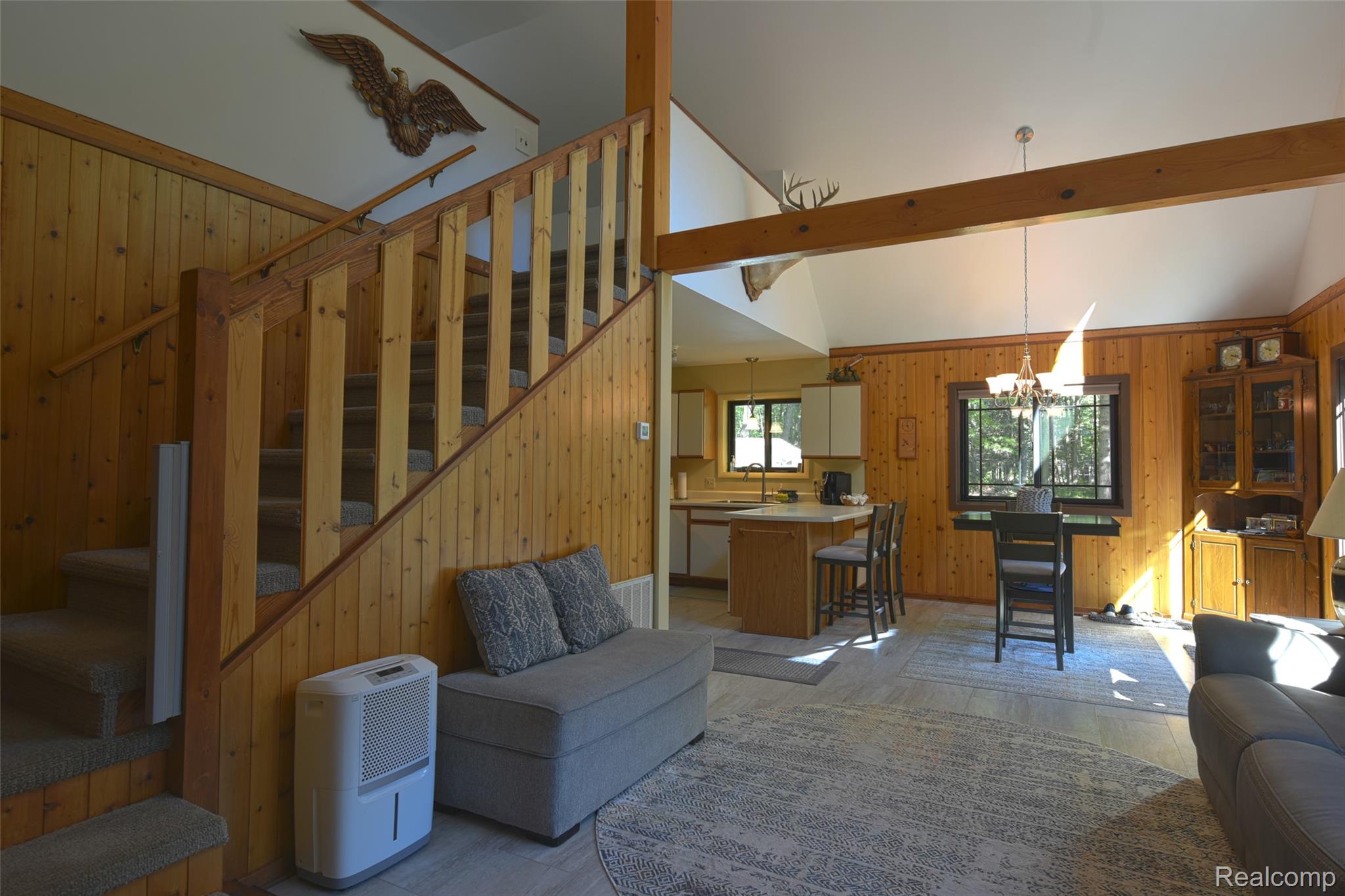5799 Goodar Road South Branch, MI 48761 - Photo 20 of 58 Open and airy with staircase up leading to upper loft bedroom