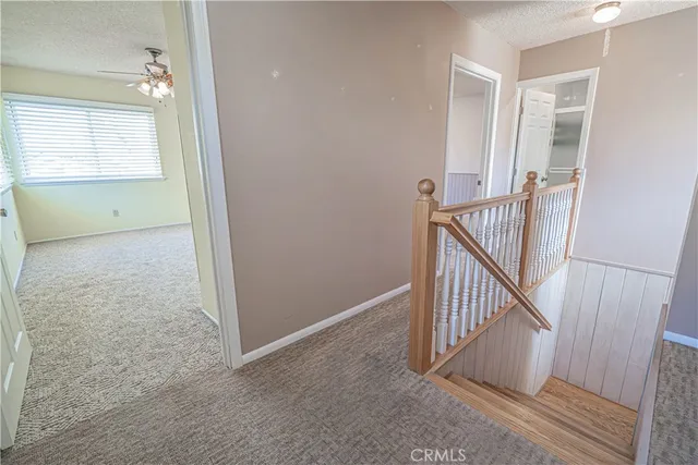 a bed room with a bed and a chandelier