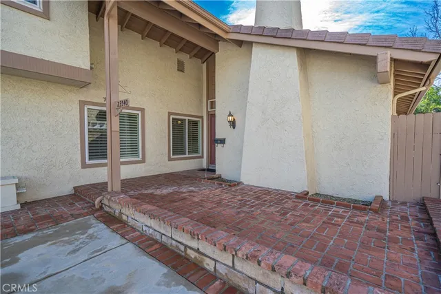 a house view with a outdoor space