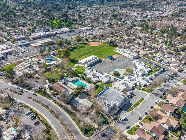 an aerial view of a city with lots of residential buildings