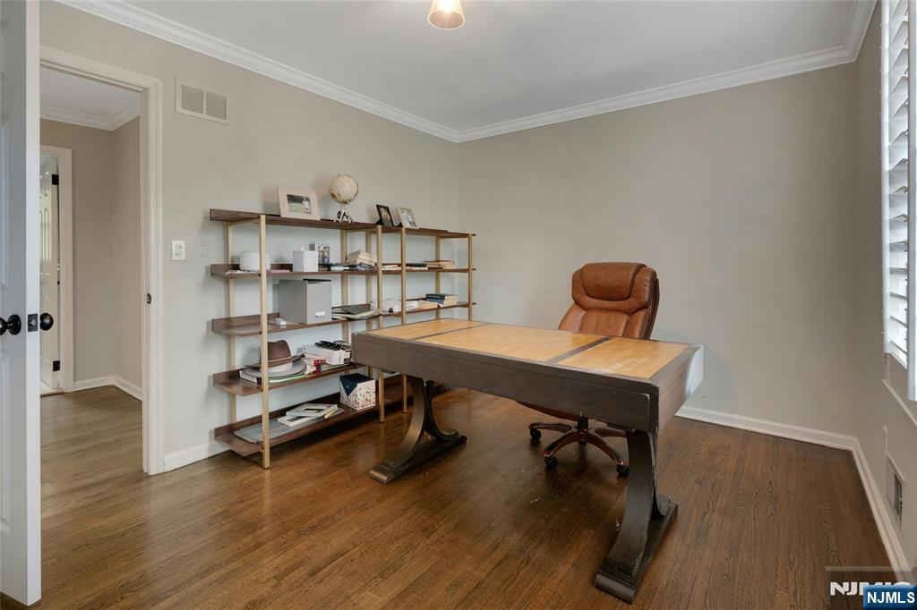 744 River Road Chatham, NJ 07928 - Photo 12 of 19 a view of a workspace with furniture and wooden floor