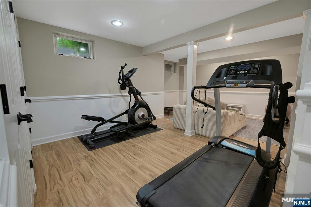 744 River Road Chatham, NJ 07928 - Photo 15 of 19 a view of a room with gym equipment