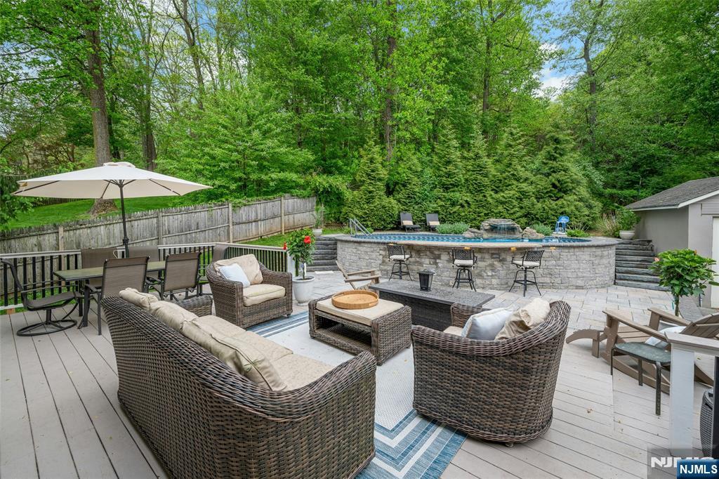 744 River Road Chatham, NJ 07928 - Photo 17 of 19 a view of outdoor sitting area with furniture and wooden deck