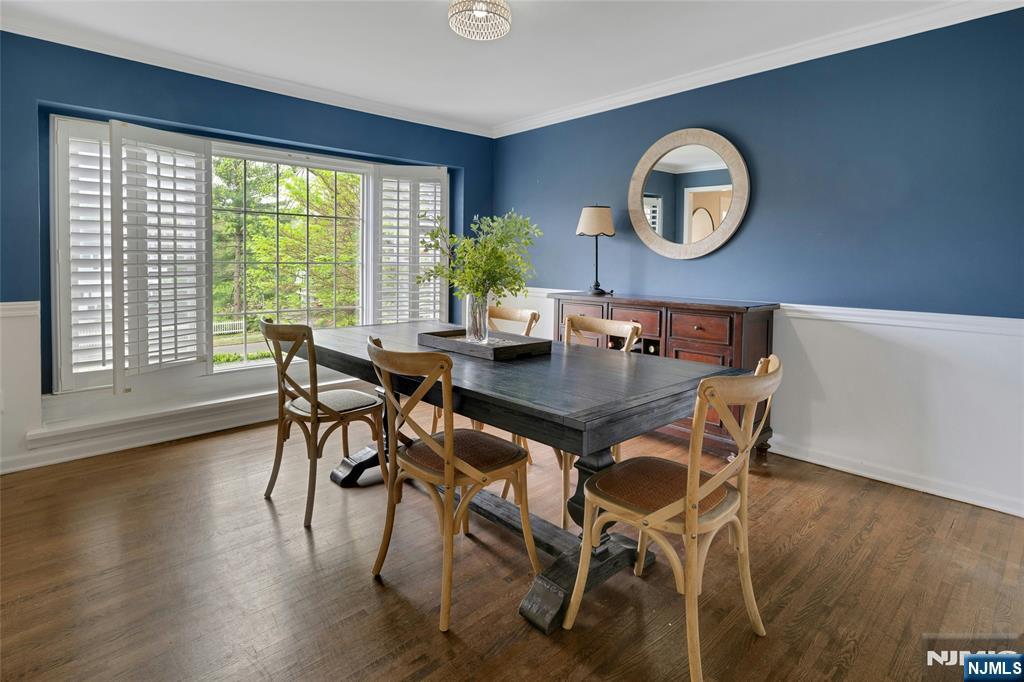 744 River Road Chatham, NJ 07928 - Photo 4 of 19 a view of a dining room with furniture and wooden floor