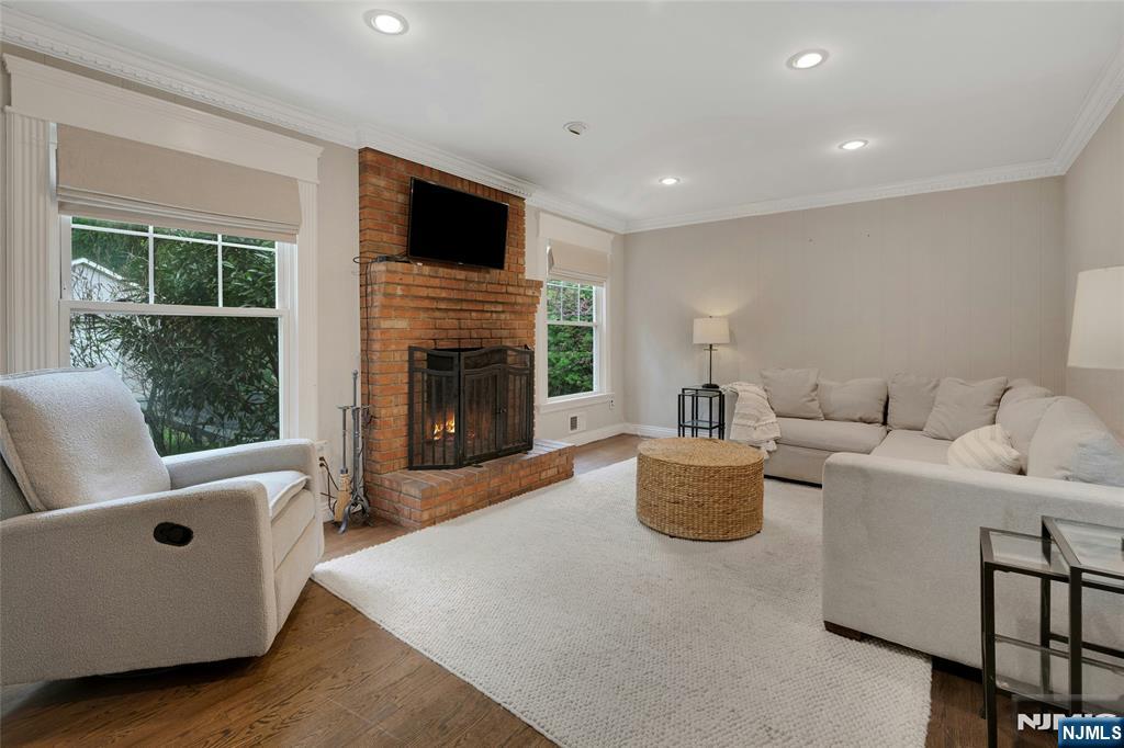 744 River Road Chatham, NJ 07928 - Photo 5 of 19 a living room with furniture and a fireplace