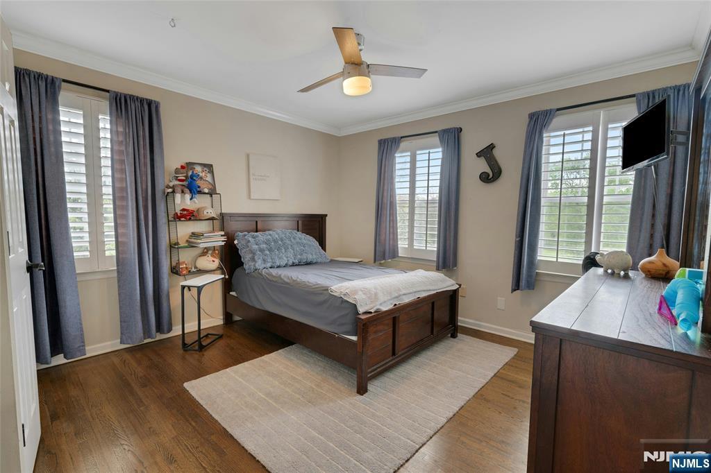 744 River Road Chatham, NJ 07928 - Photo 10 of 19 a bedroom with a bed and a window