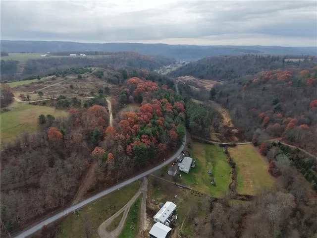 a view of a yard with mountains