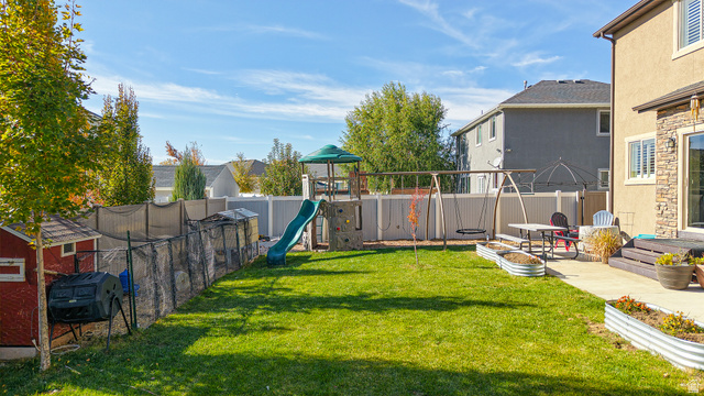 368 East 700 North Springville, UT 84663 - Photo 43 of 55 Fenced backyard featuring a playground and a patio