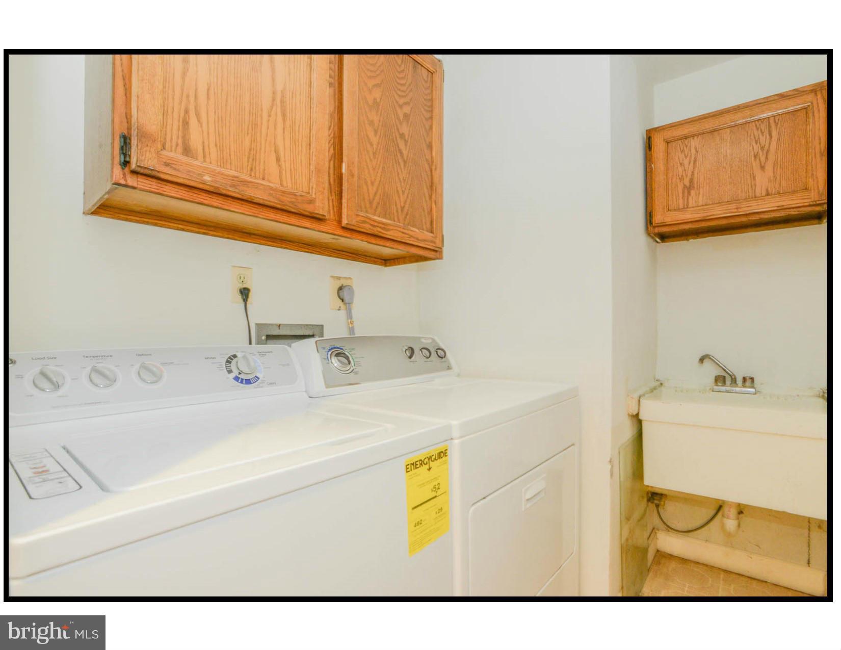 6914 Fox Chase Road New Market, MD 21774 - Photo 18 of 26 Laundry Room with Utility Sink