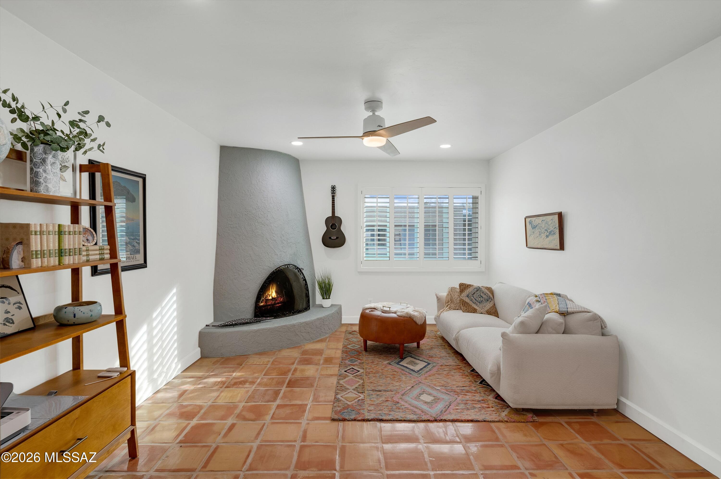 6941 East Rivercrest Road Tucson, AZ 85750 - Photo 12 of 32 a living room with furniture and a window