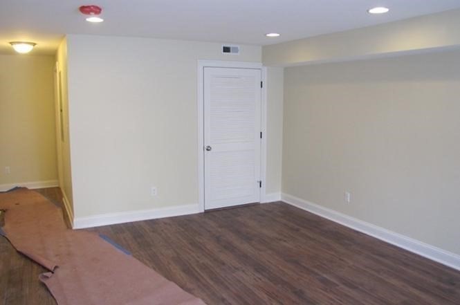 210 South Quinsigamond Avenue, Unit 1 Shrewsbury, MA 01545 - Photo 9 of 11 a view of an empty room with wooden floor