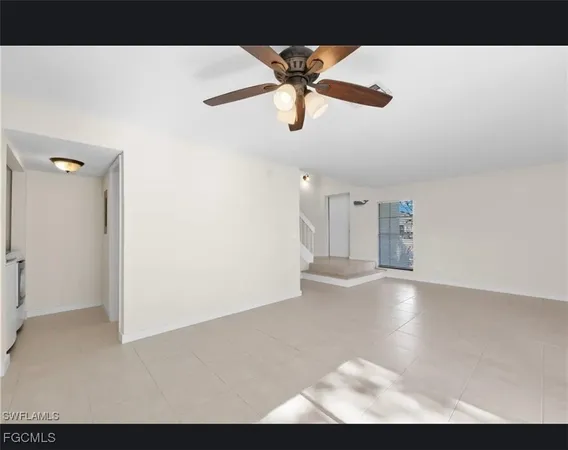 a view interior of a house a ceiling fan and window