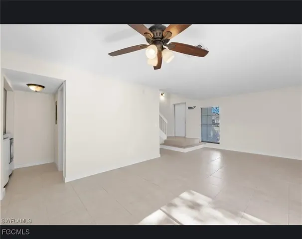 a view interior of a house a ceiling fan and window
