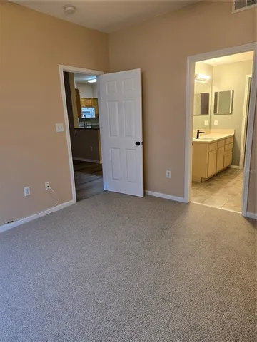 a bathroom with sinks granite and a sink