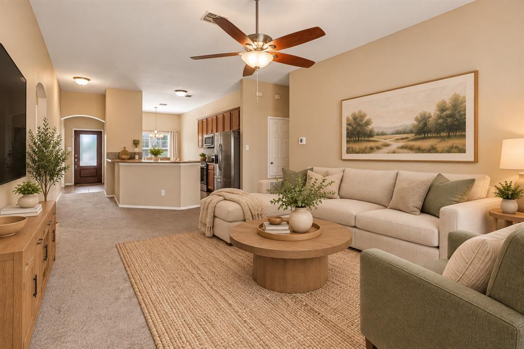 101 Ravinia Court Oak Point, TX 75068 - Photo 4 of 23 Open-concept living space with vaulted ceilings, a ceiling fan, and recessed lighting