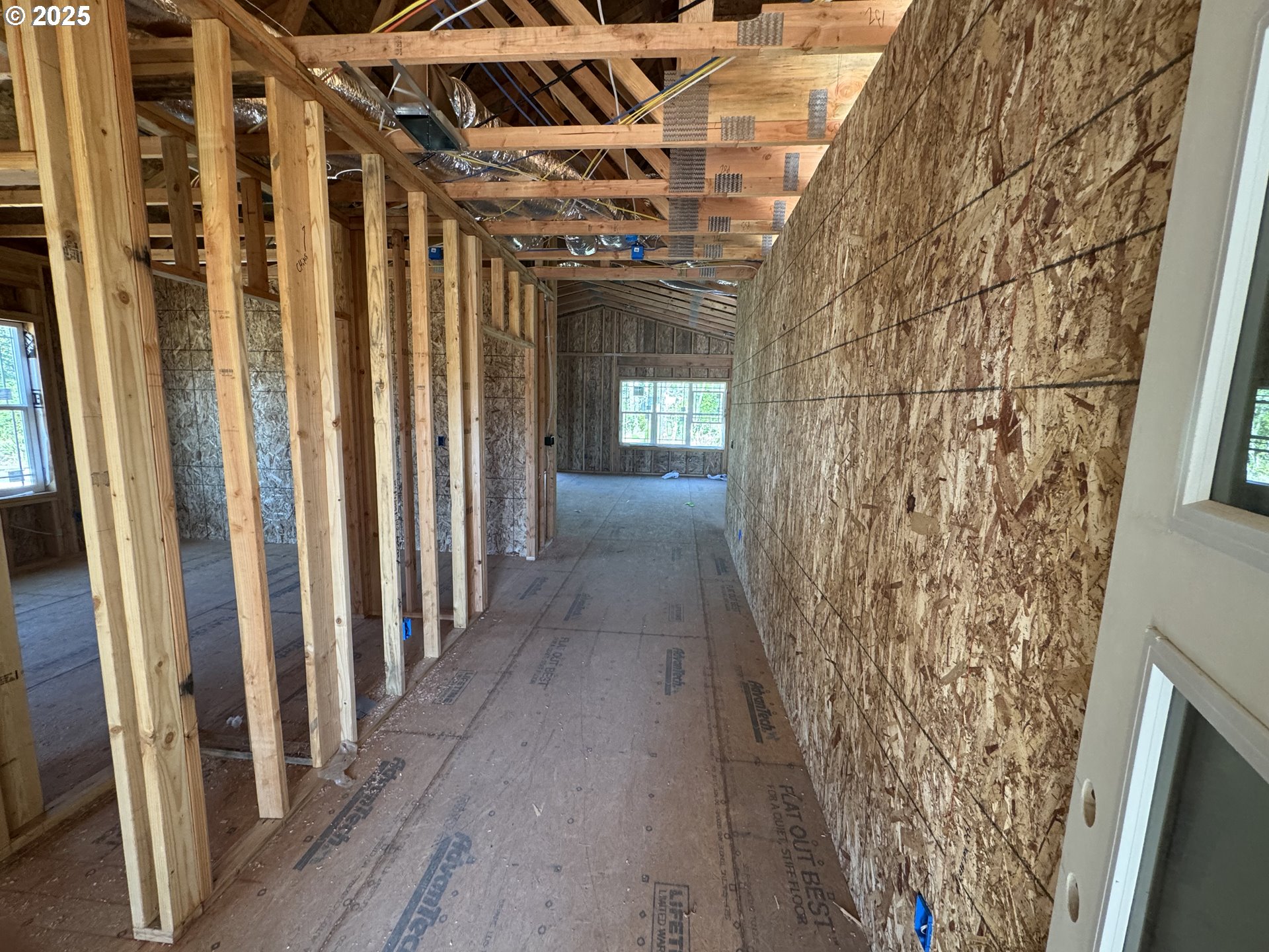 1229 Lighthouse Lane Brookings, OR 97415 - Photo 20 of 28 a view of hallway with wooden floor