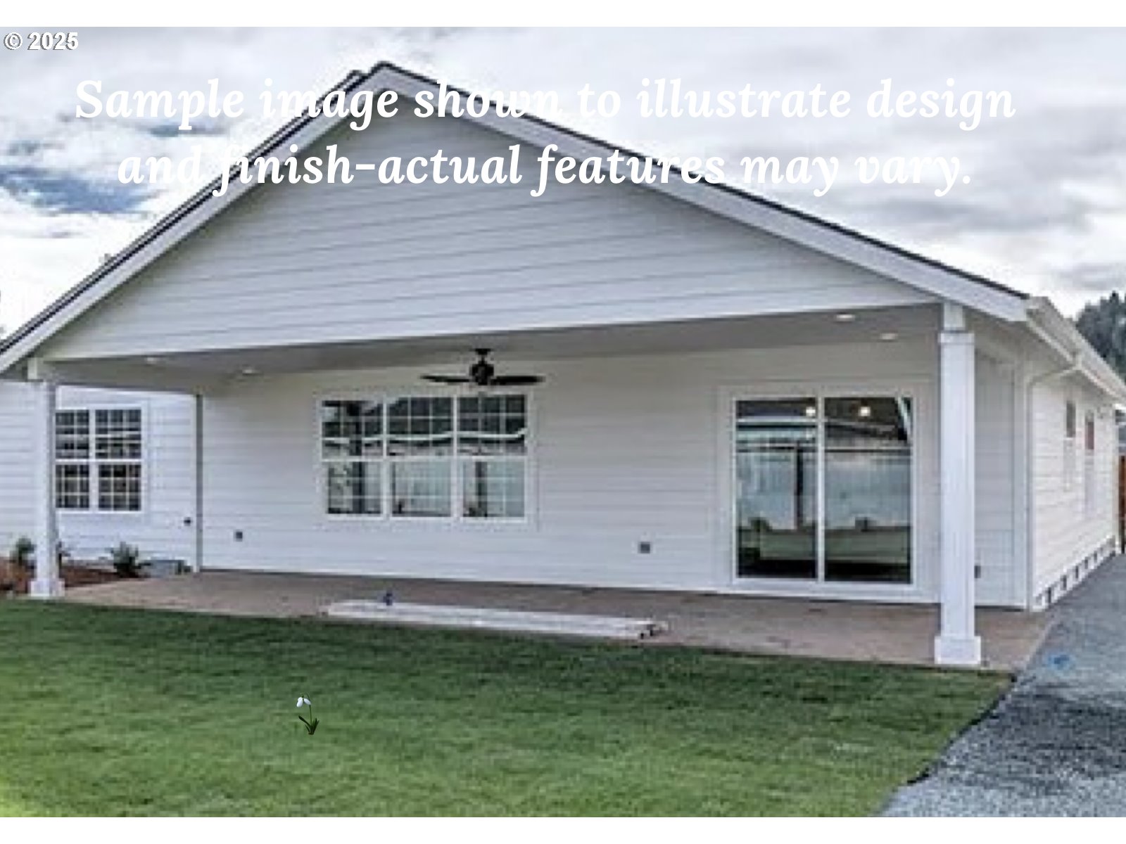 1229 Lighthouse Lane Brookings, OR 97415 - Photo 2 of 28 a view of a backyard of the house