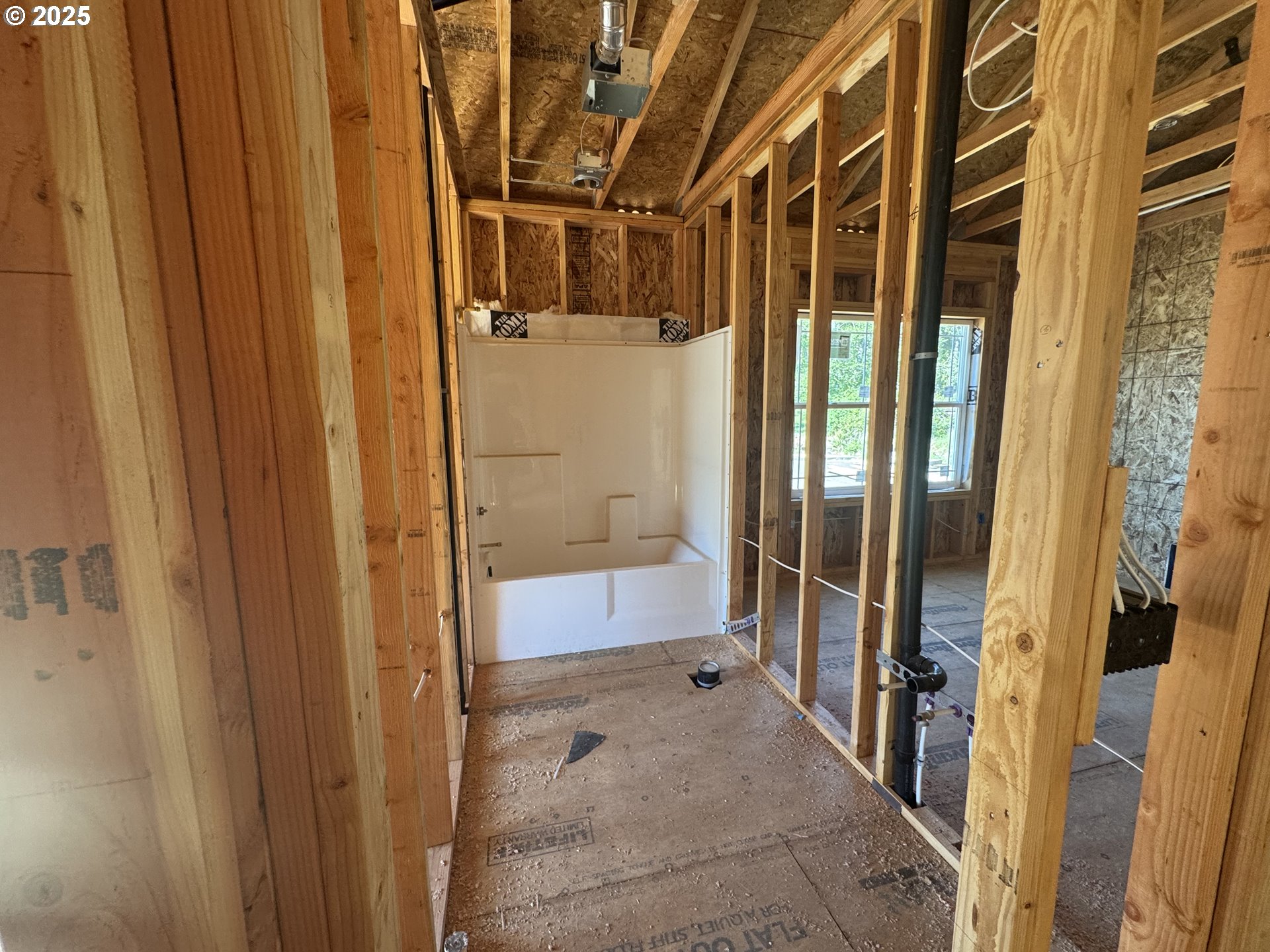 1229 Lighthouse Lane Brookings, OR 97415 - Photo 23 of 28 a bathroom with a tub and shower