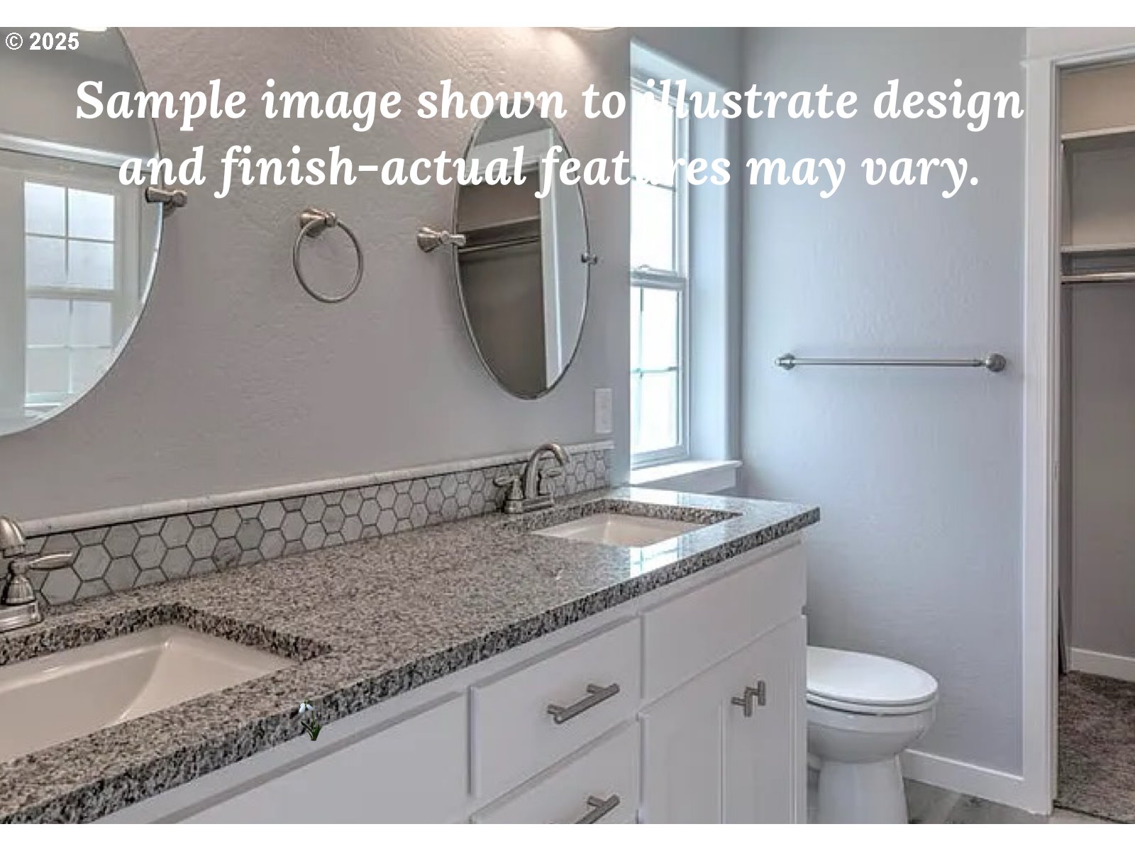 1229 Lighthouse Lane Brookings, OR 97415 - Photo 8 of 28 a bathroom with a granite countertop toilet sink and mirror