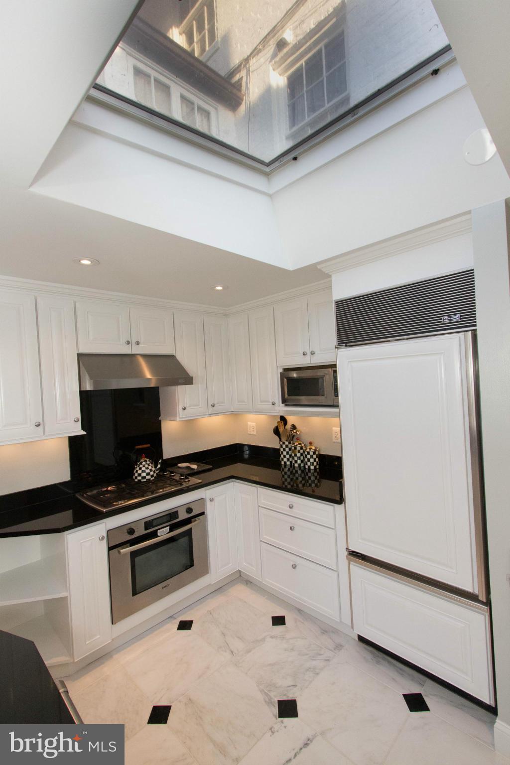 3409 O Street Northwest Washington, DC 20007 - Photo 8 of 30 Kitchen with view of Private Patio