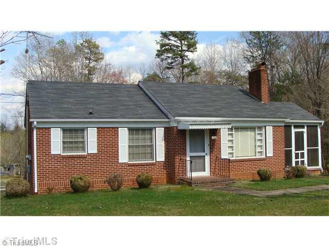 1326 Austin Traphill Road Elkin, NC 28621 - Photo 2 of 6 Exterior Front. Cute little brick rancher just minutes to town and interstate.