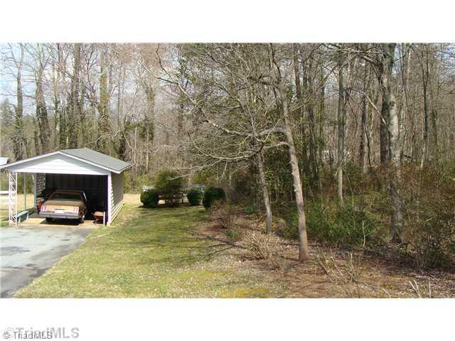 1326 Austin Traphill Road Elkin, NC 28621 - Photo 3 of 6 Outbuilding. Come Home to your own slice of paradise Just minutes form Stone Mountain State Park or Elkin