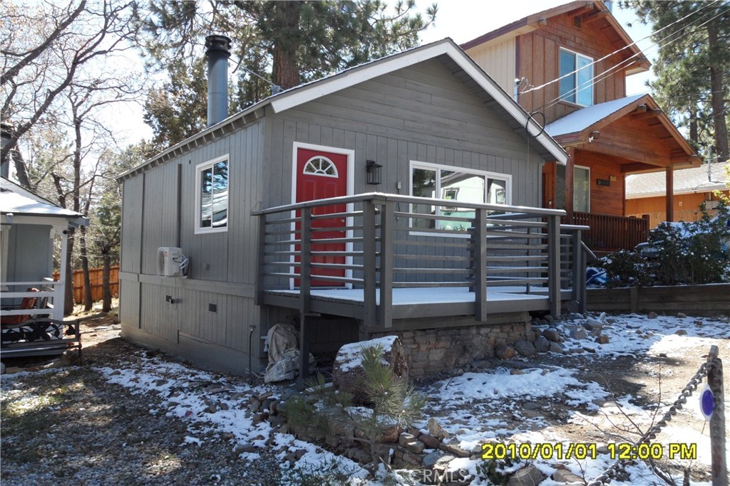 871 Maple Lane Sugarloaf, CA 92386 - Photo 15 of 17 a front view of a house with a yard