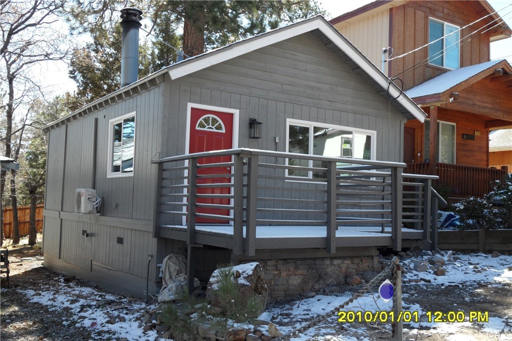 871 Maple Lane Sugarloaf, CA 92386 - Photo 2 of 17 a front view of a house with stairs