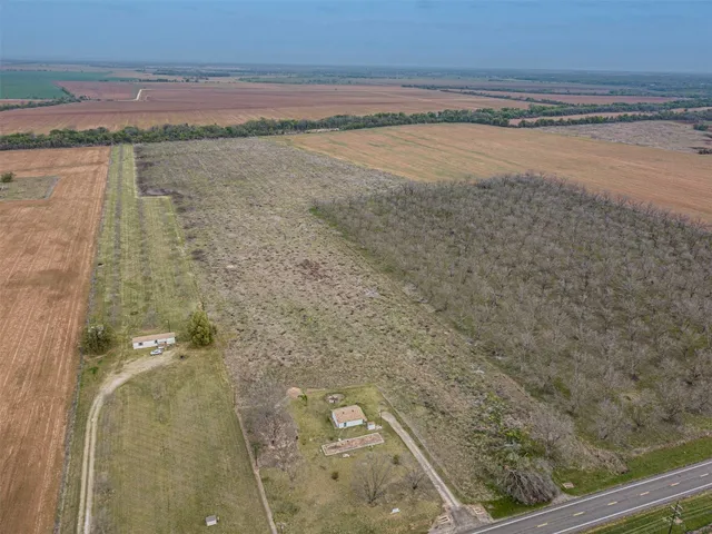 a view of a swimming pool and an outdoor space