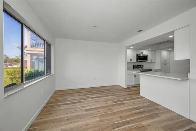 a bathroom with a sink a mirror and a toilet