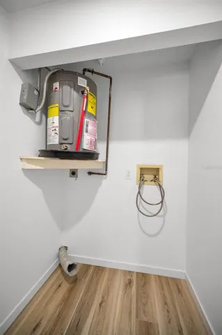 a view of a swimming pool with a table and chairs