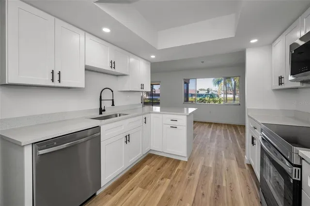 a view of a lake with houses