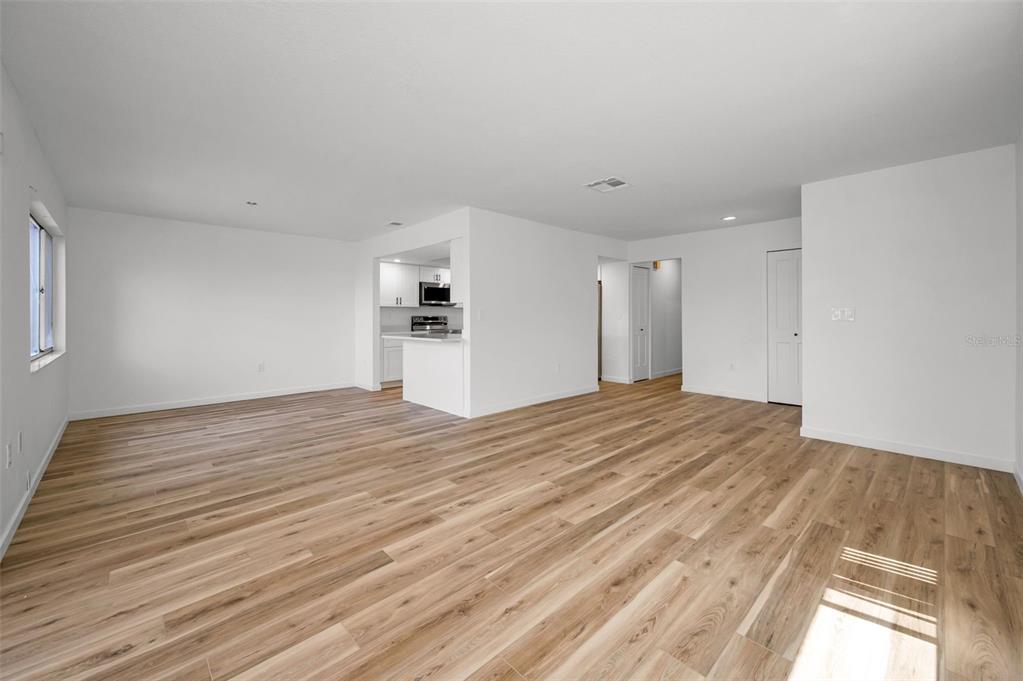 3847 Lighthouse Way, Unit 3847 New Port Richey, FL 34652 - Photo 41 of 89 a view of empty room with wooden floor