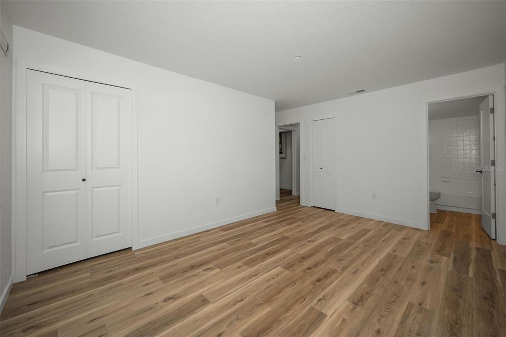 3847 Lighthouse Way, Unit 3847 New Port Richey, FL 34652 - Photo 45 of 89 a view of empty room with wooden floor