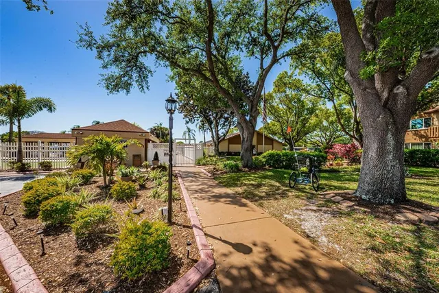 a house with trees in the background