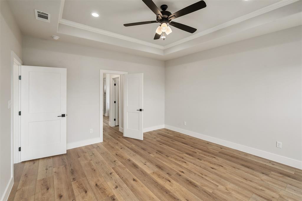 507 Limestone Circle Mabank, TX 75147 - Photo 18 of 36 wooden floor in an empty room