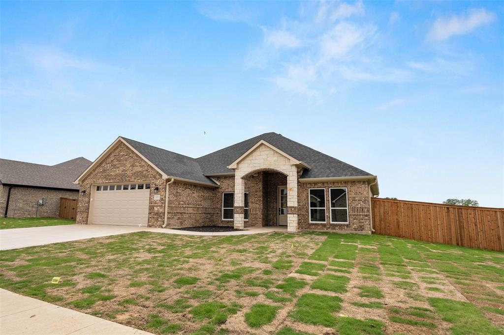 507 Limestone Circle Mabank, TX 75147 - Photo 33 of 36 a front view of a house with a yard
