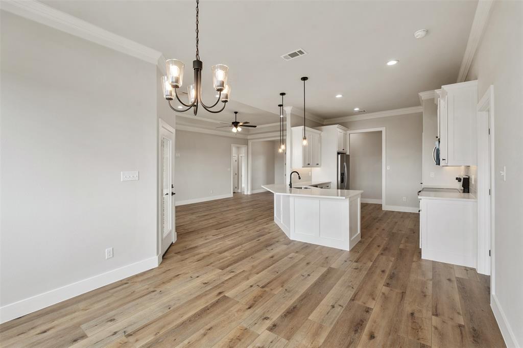 507 Limestone Circle Mabank, TX 75147 - Photo 10 of 36 a view of a kitchen and kitchen with a sink
