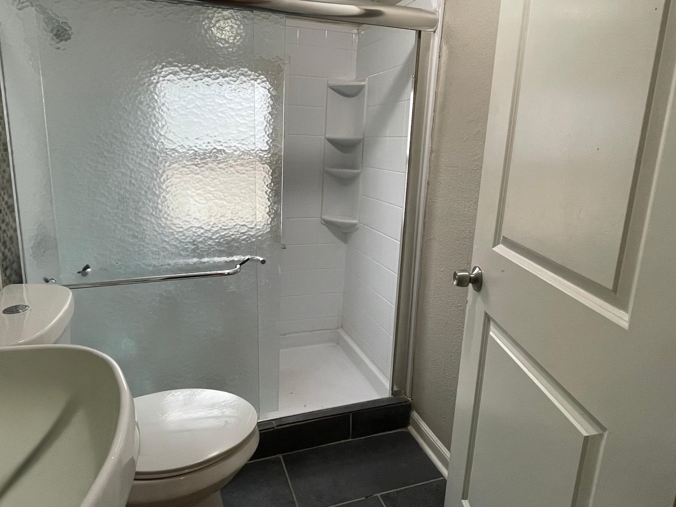 984 East Raines Road Memphis, TN 38116 - Photo 13 of 19 a bathroom with a toilet and a sink