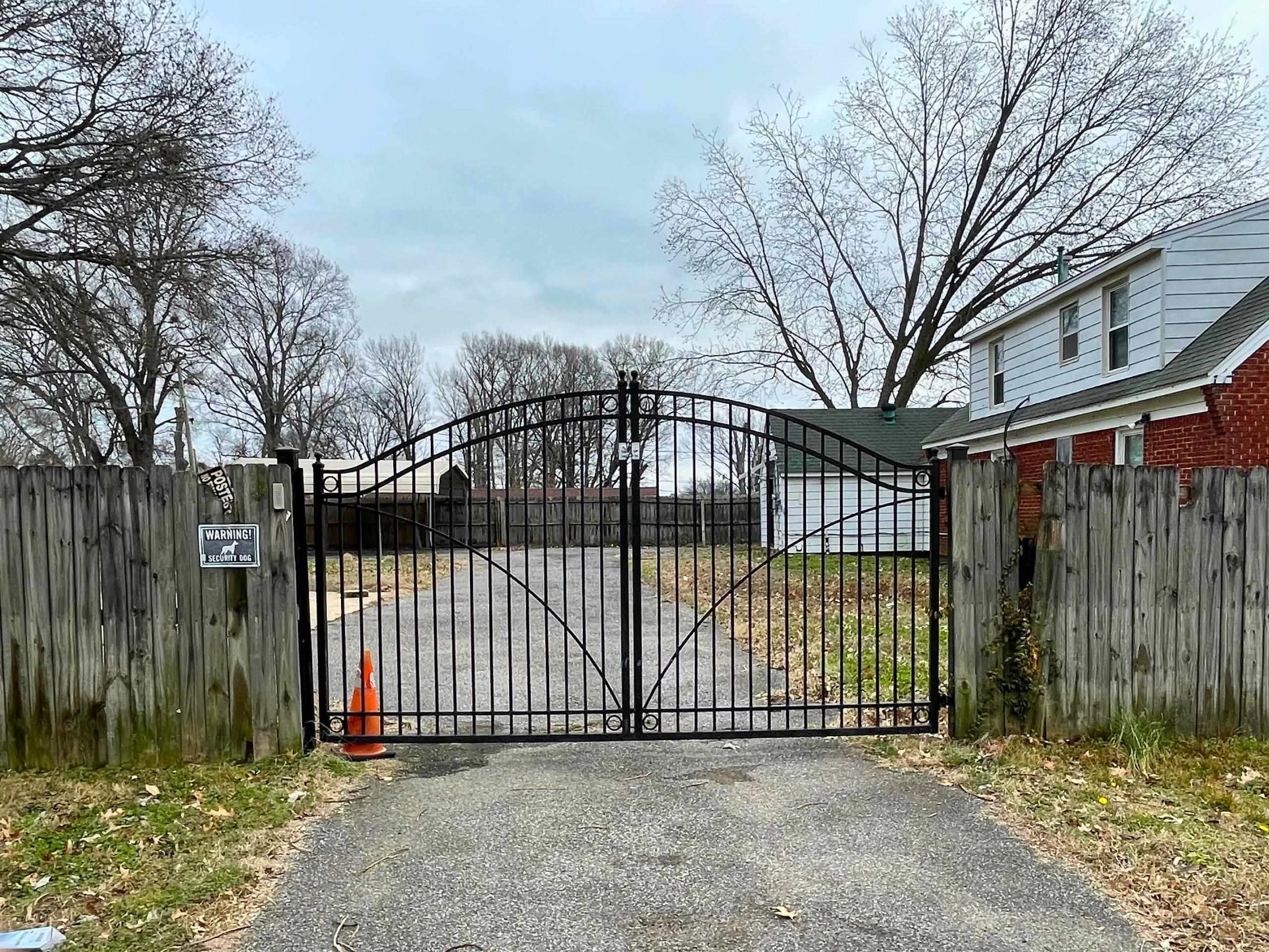 984 East Raines Road Memphis, TN 38116 - Photo 15 of 19 a view of a backyard with a fence