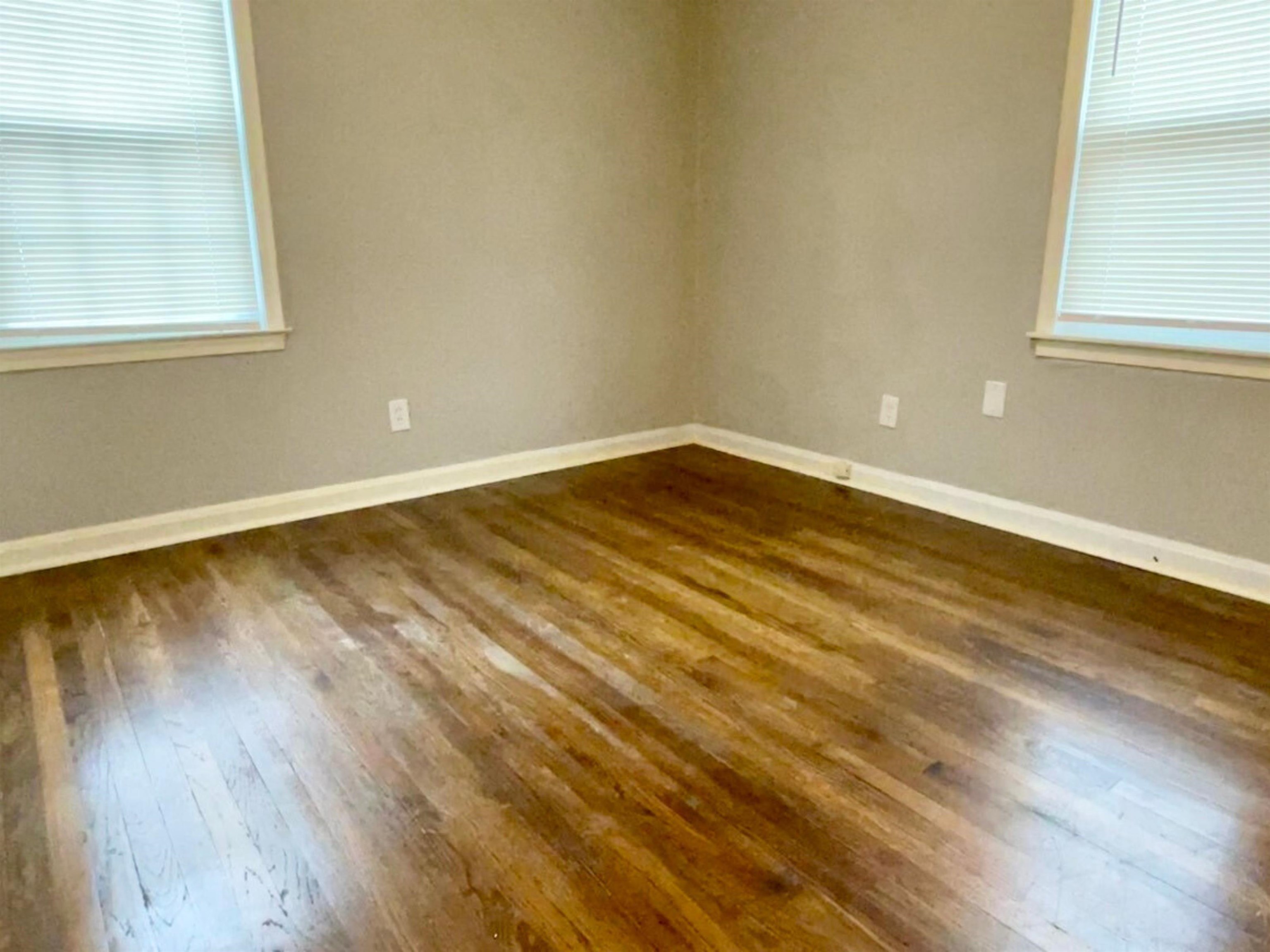 984 East Raines Road Memphis, TN 38116 - Photo 5 of 19 a view of empty room with wooden floor and fan