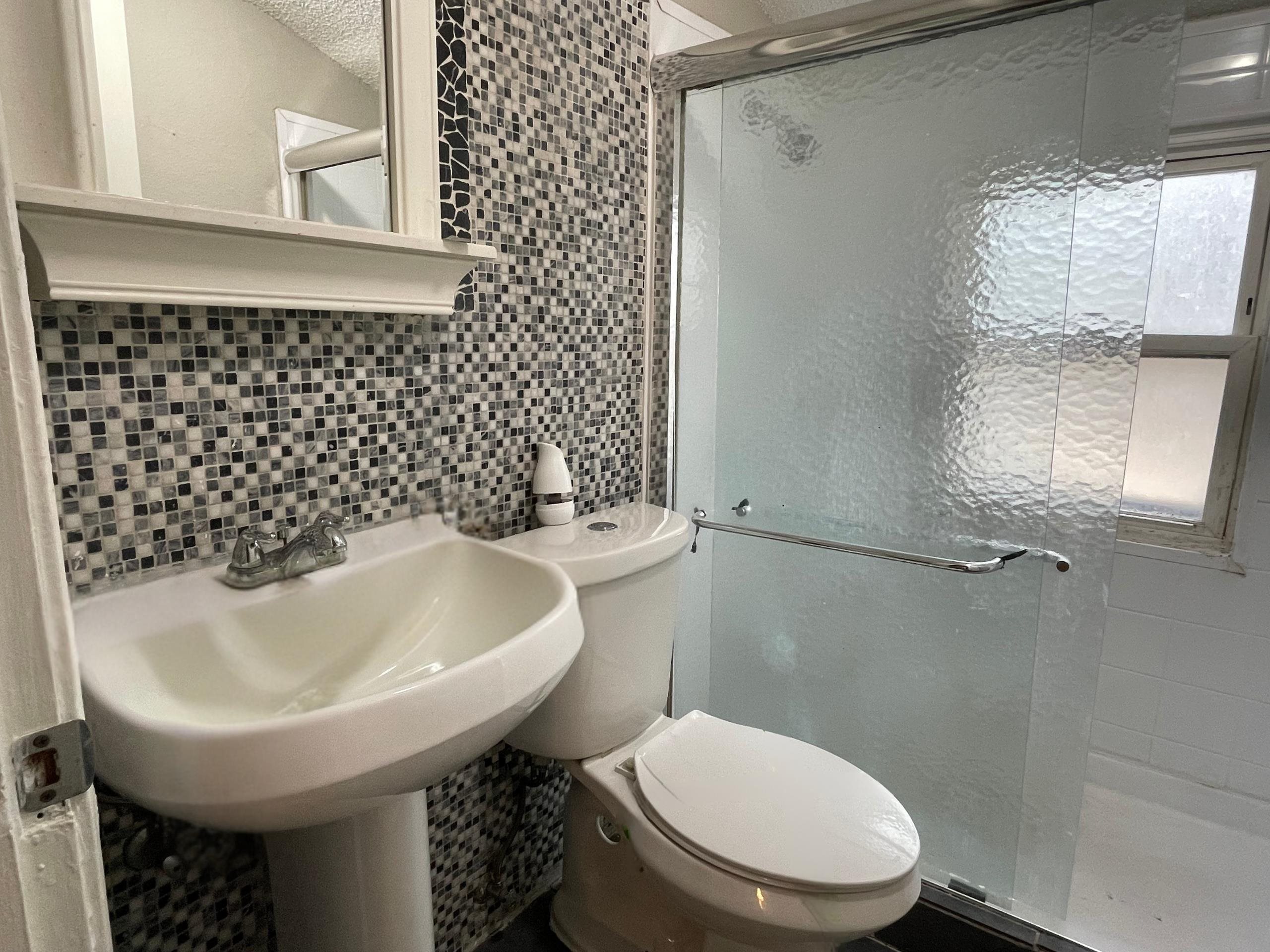 984 East Raines Road Memphis, TN 38116 - Photo 10 of 19 a bathroom with a sink toilet and shower